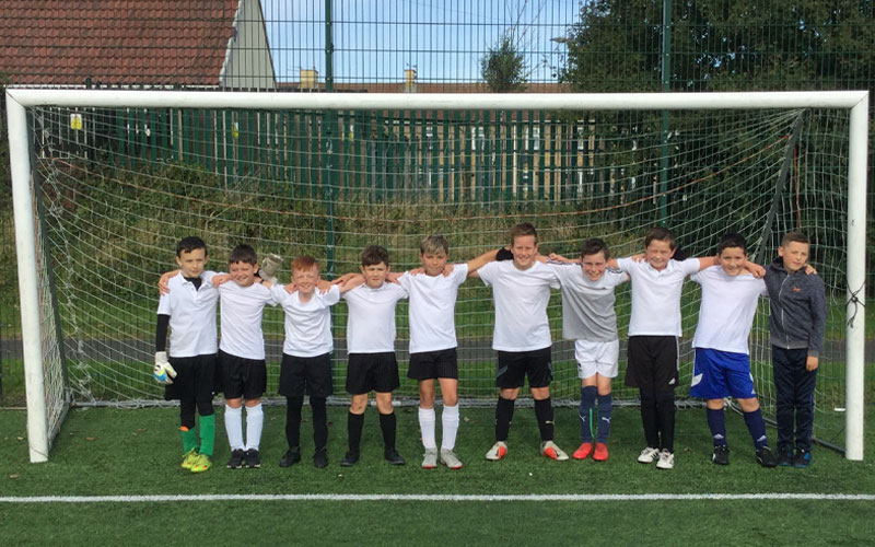 Students at St Wilfrids at a football after school club